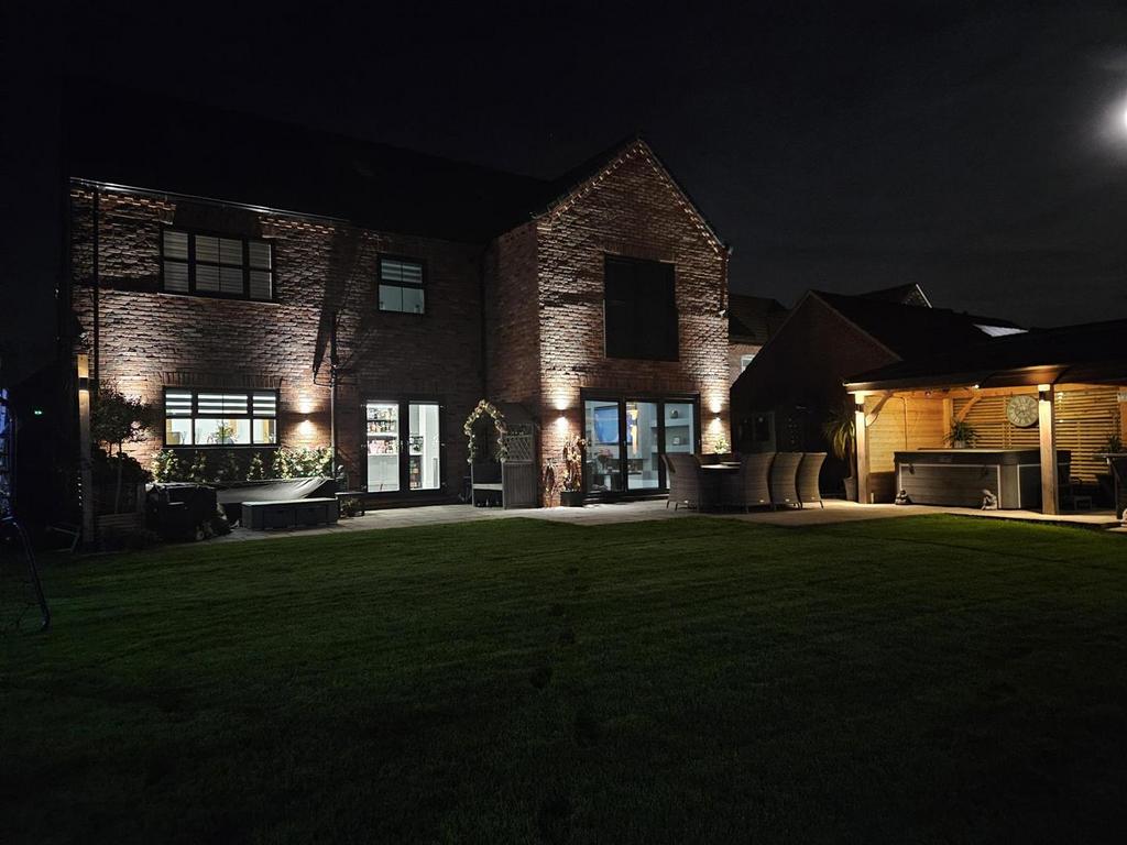 Twilight rear elevation photo