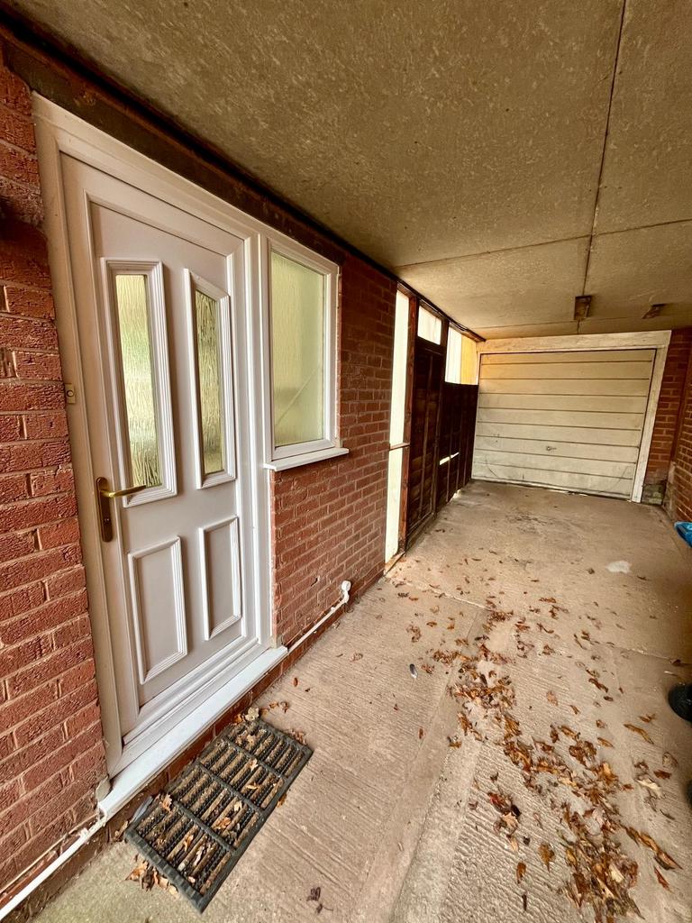 Side entrance/carport/garage