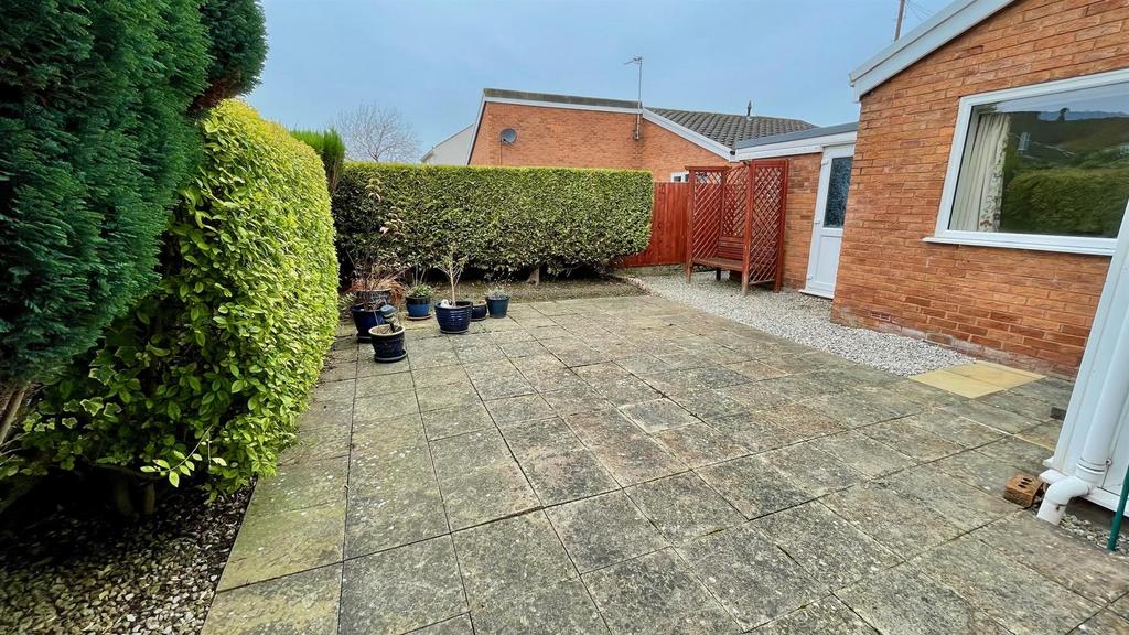 Enclosed paved rear garden