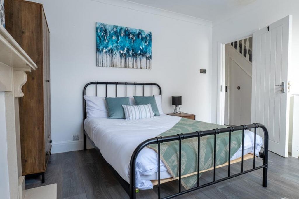 A stylish and inviting double bedroom featuring...