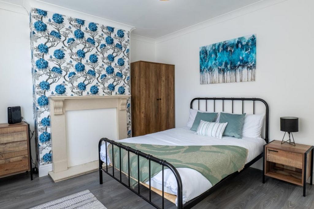 A stylish and inviting double bedroom featuring...