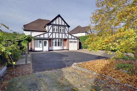 4 bedroom detached house for sale, Stunning Four-Bedroom Family Home in Desirable Ferndown Location with Landscaped Garden & Ample Parking