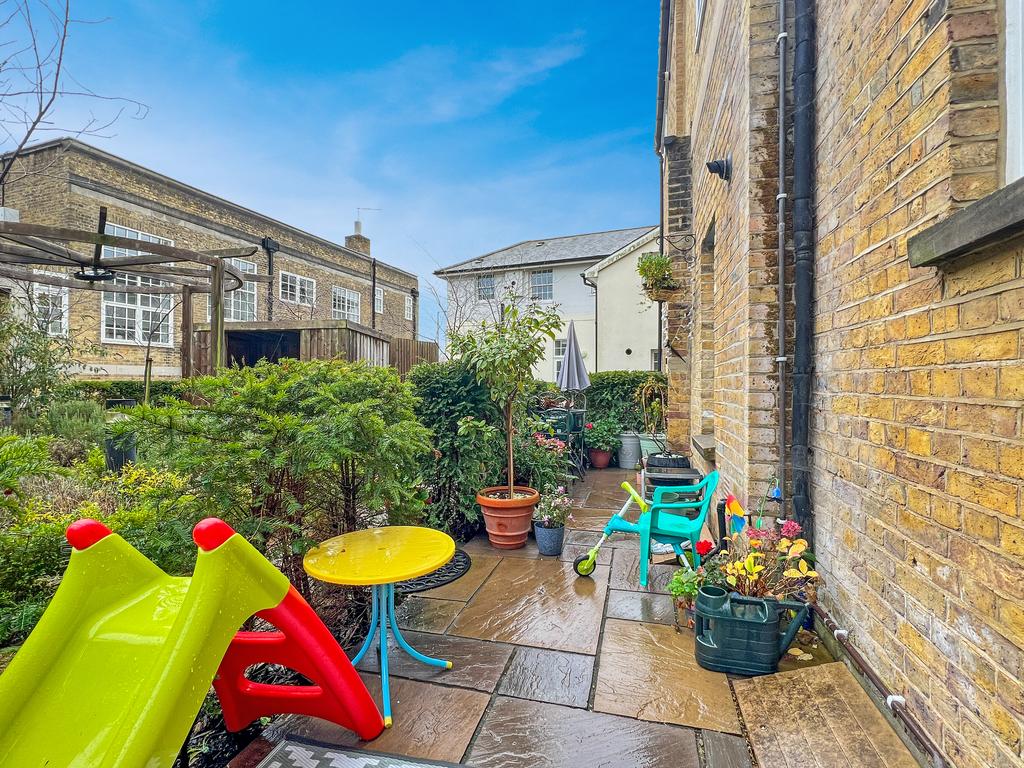 Communal Gardens With Private Patio Area