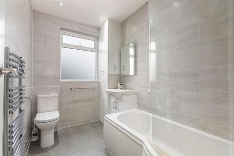 18 Abbott Avenue, London, SW20 8SQ
