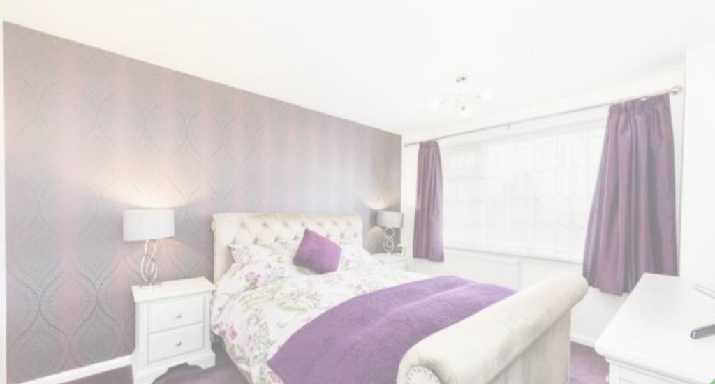 A spacious and inviting large double bedroom wi...