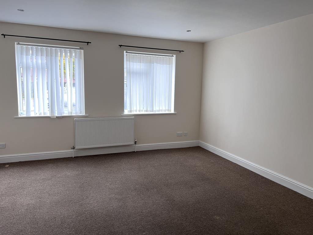 Living room looking out to communal car park