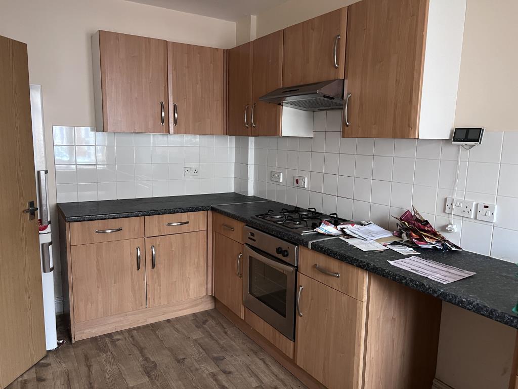 Modern fitted kitchen units with vinyl floor