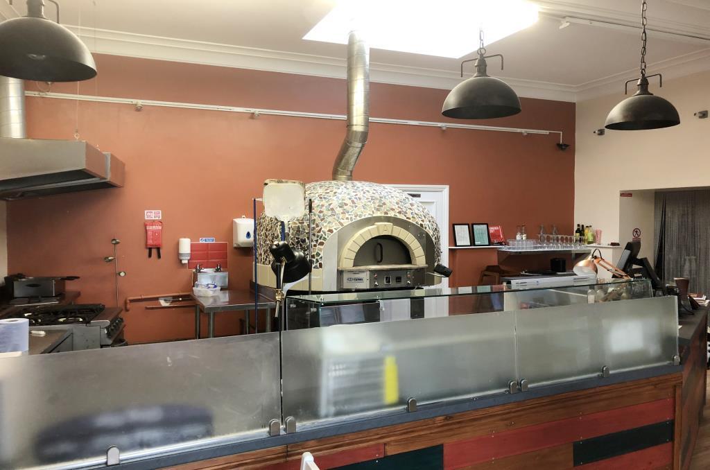 Kitchen area with pizza oven