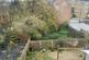View of rear garden of Former House in Multiple Oc
