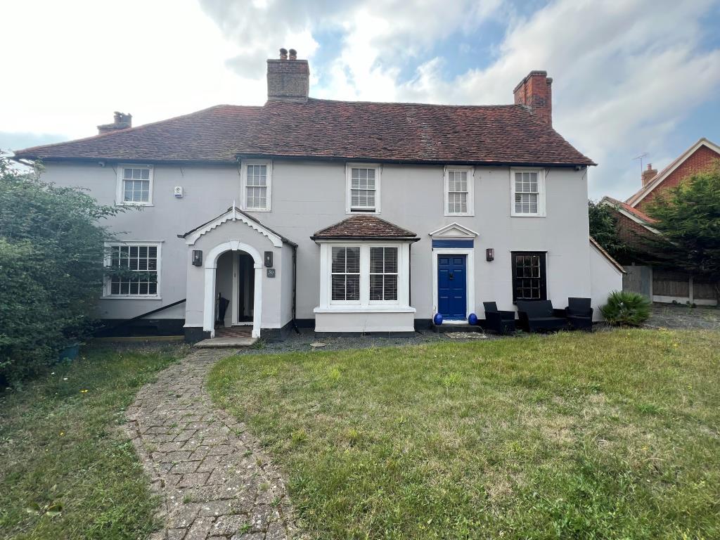 Path leading to front door with side access to rea