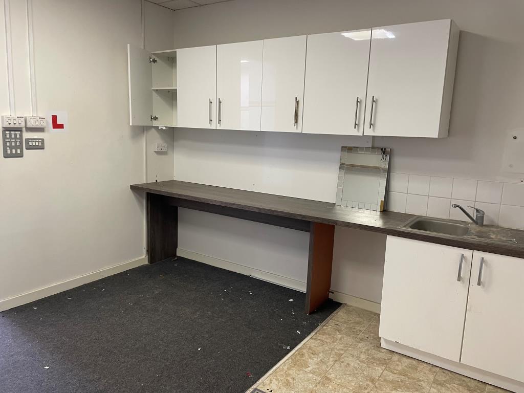 Kitchen with fitted white units