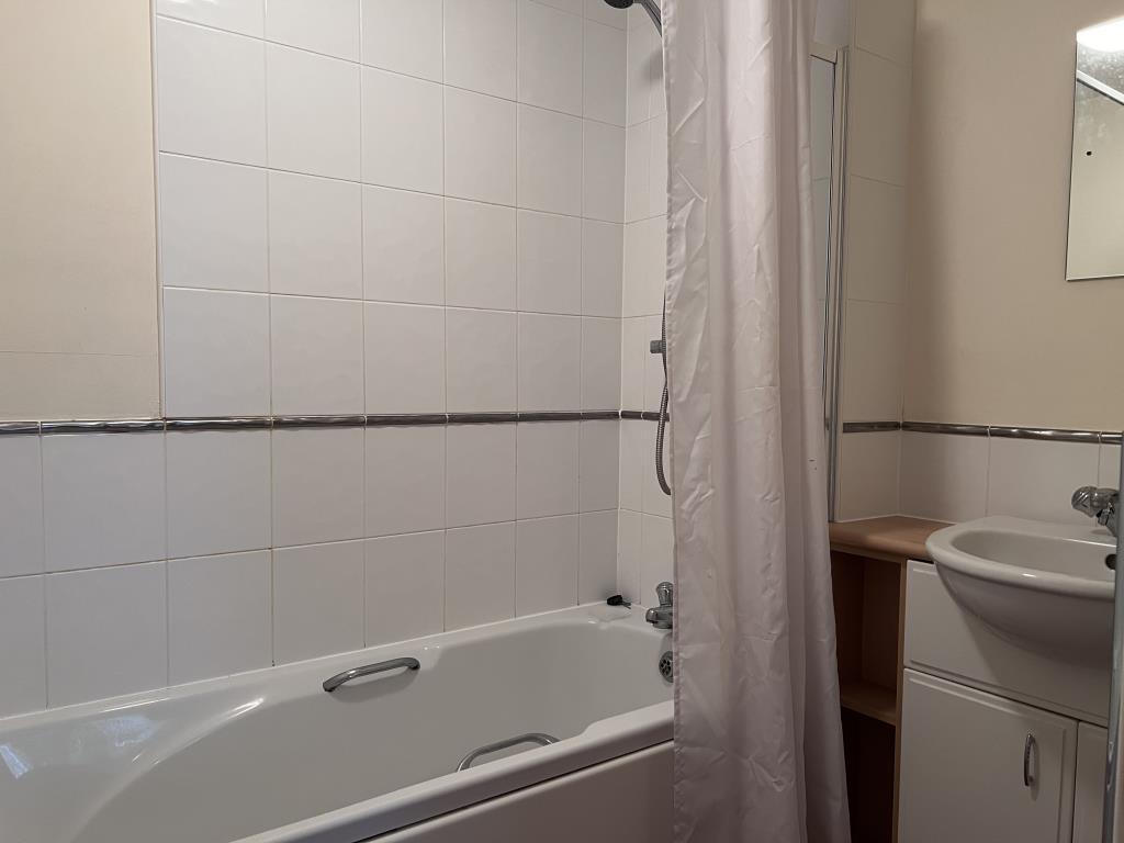 Bathroom with white bath and hand basin