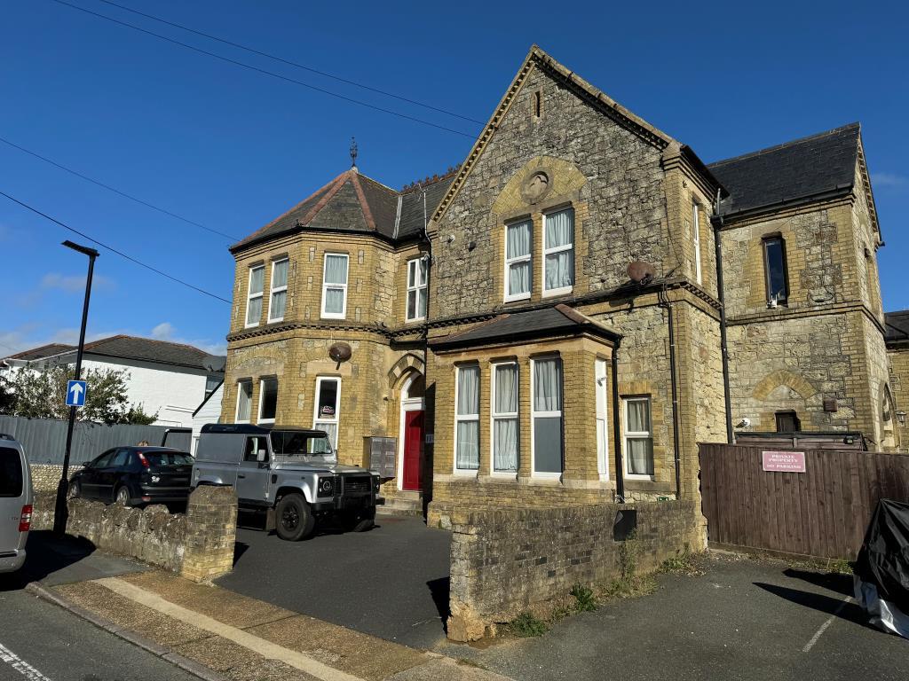 Front elevation with red communal door