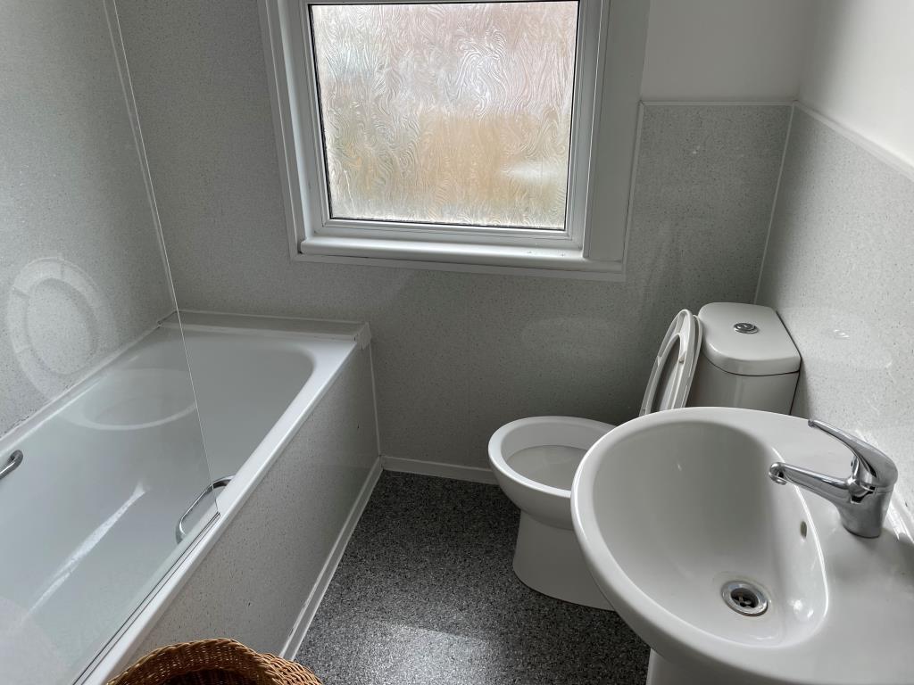 White bathroom suite and WC