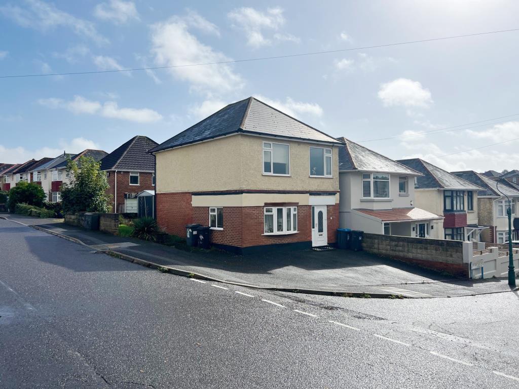 Detached building with off road parking area