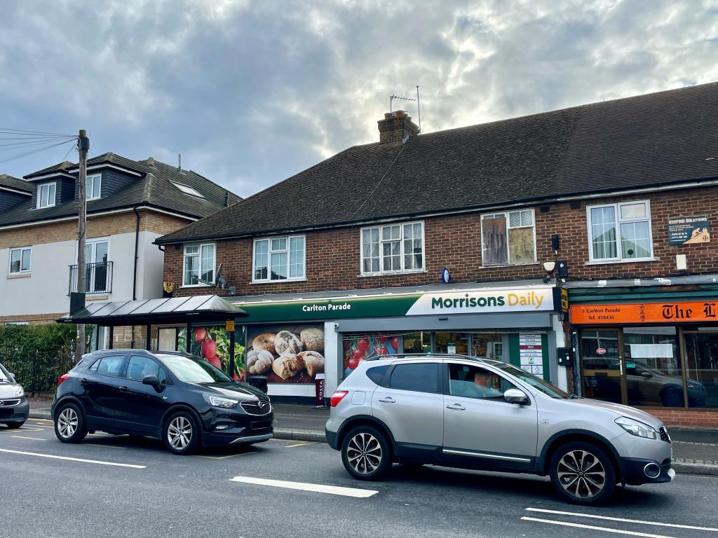 Flat above parade of shops