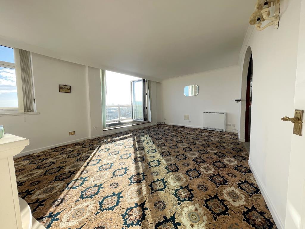 Living room with doors to balcony