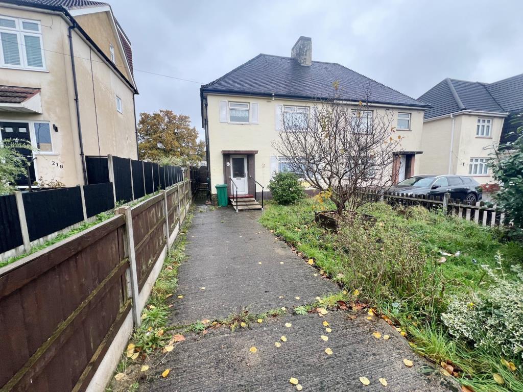 Driveway leading to front door