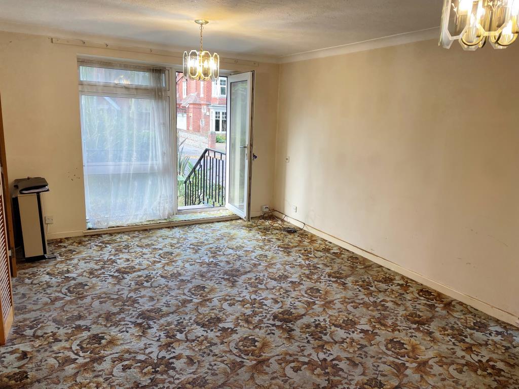 Living room with door to rear garden