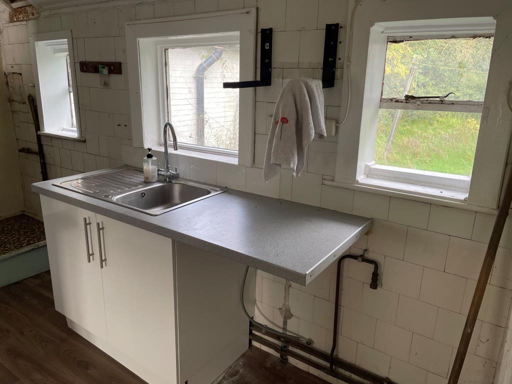 Kitchen with sink unit
