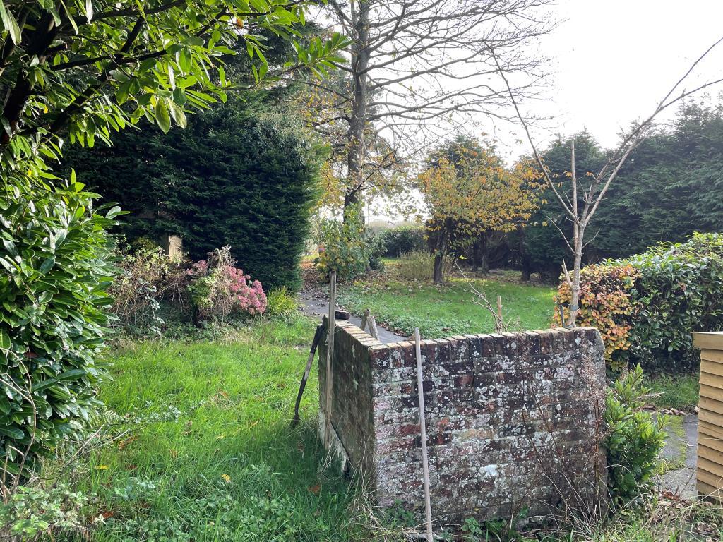 Gardens with pathway to house