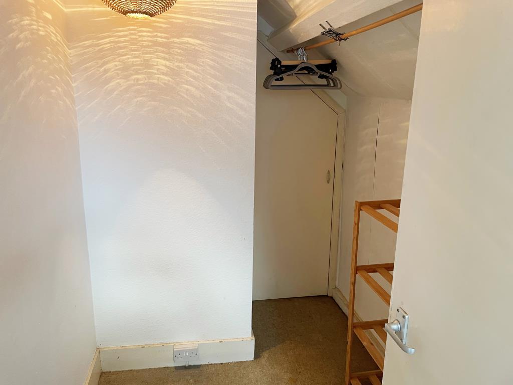 Dressing room with door to eaves