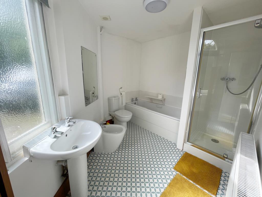 Ground floor bathroom with five piece suite and wi