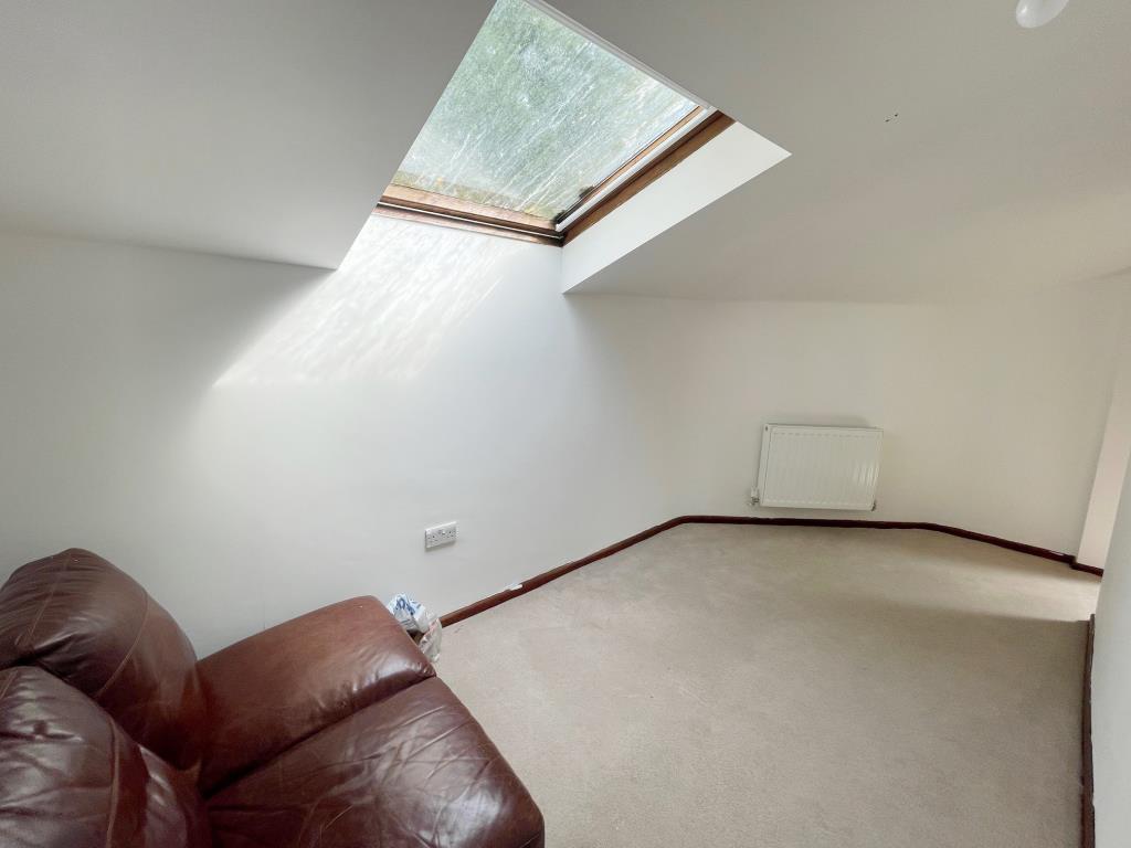 Further bedroom with skylight window