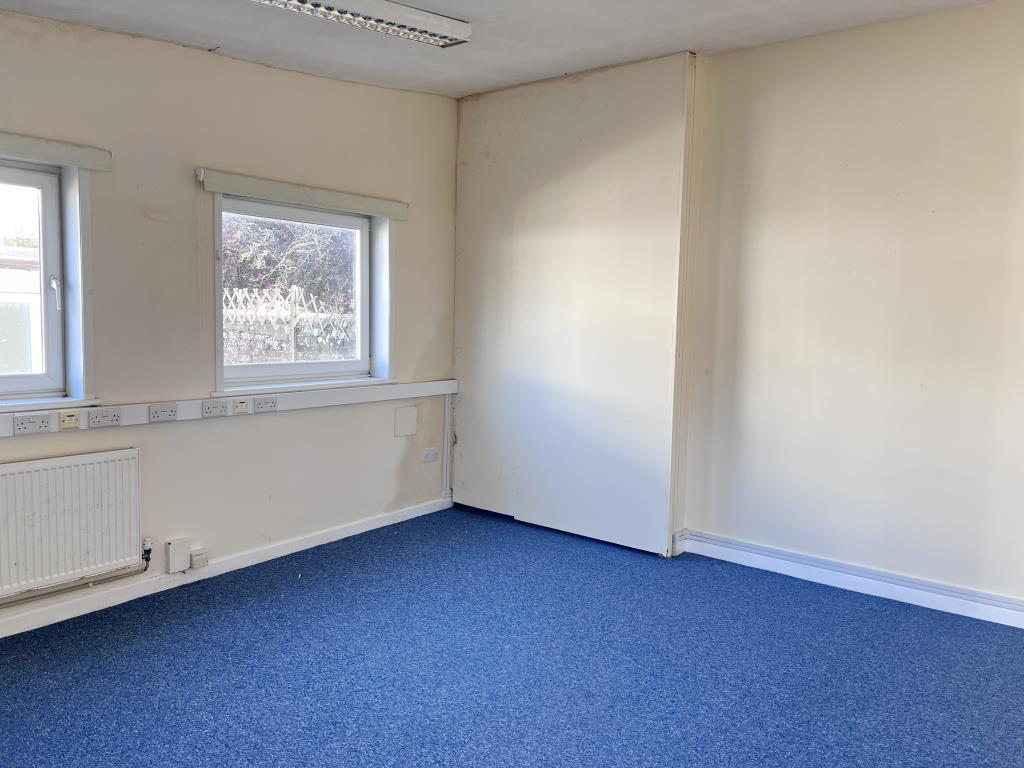 Ground floor office room at rear of building