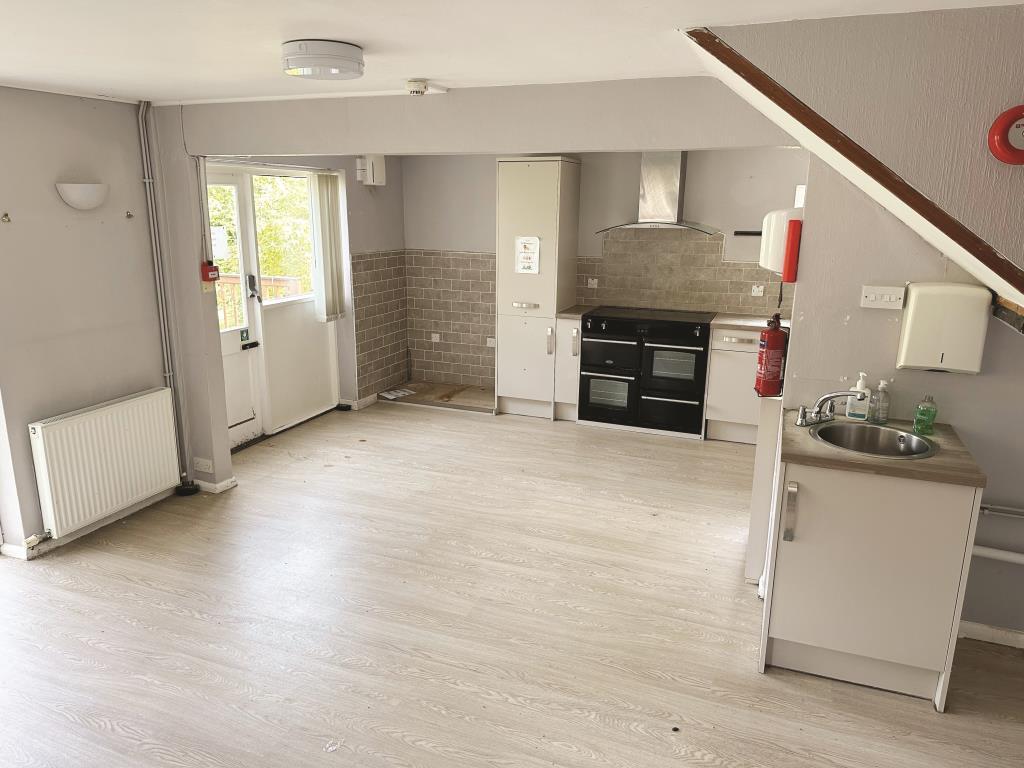 Lower ground floor kitchen with access into garden