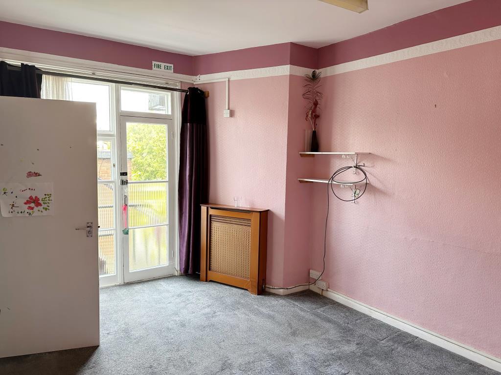 Bedroom with en-suite and access into garden