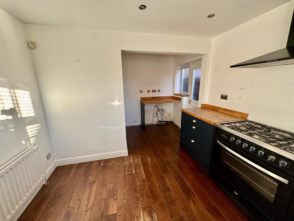 Kitchen into Utility Area