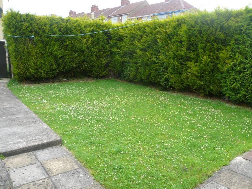 A spacious garden area, perfect for outdoor rel...