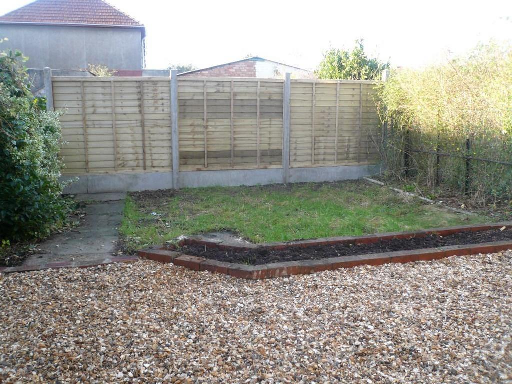 A spacious garden area with potential for outdo...