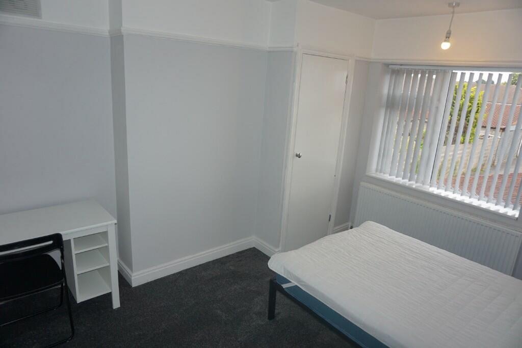 A spacious and bright double bedroom, perfect f...