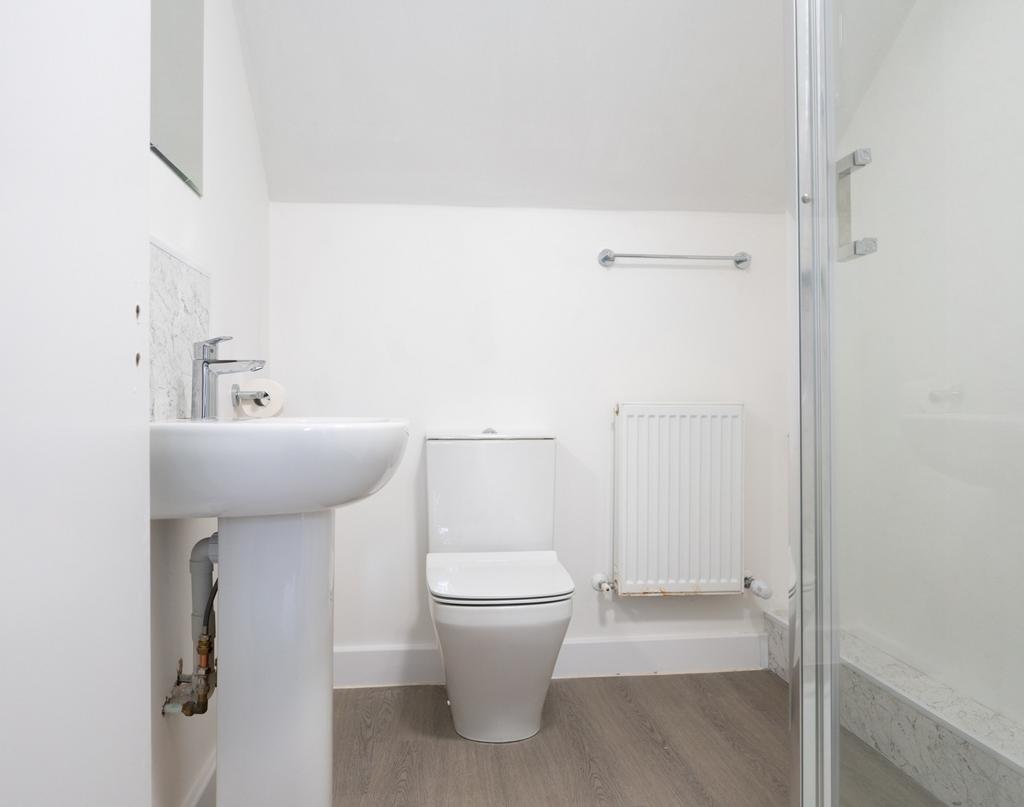 A bright and clean bathroom featuring a modern ...