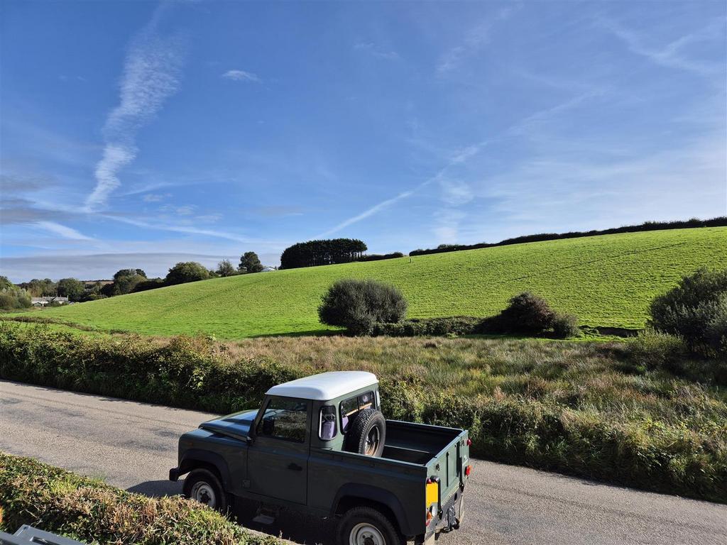 View from the bottom of the plot onto Tehidy Road.