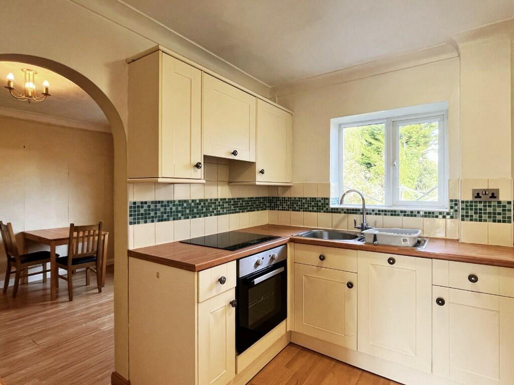 A bright and tidy kitchenette with modern ameni...