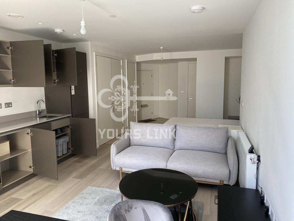 A spacious and stylish modern living room fille...