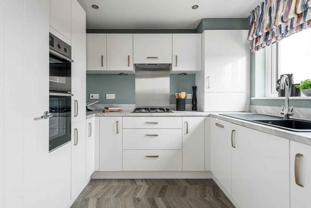 3 sided kitchen with plenty of storage space