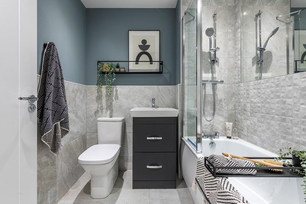Family-friendly bathroom with shower over bath