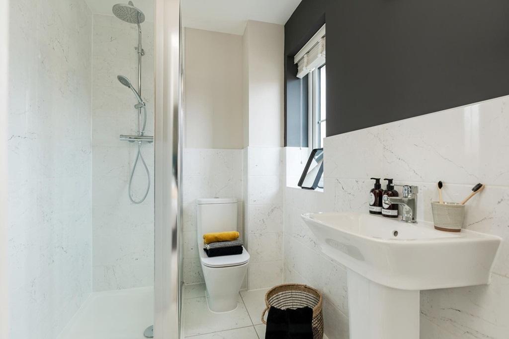 The main bedroom boasts its own en suite shower...