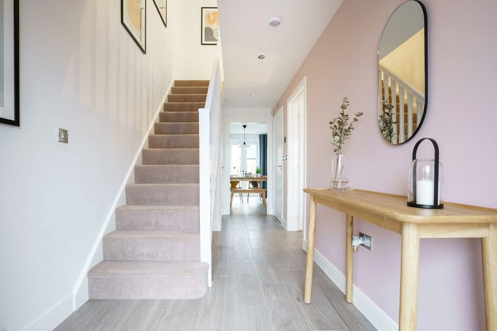 Bright hallway with under stairs storage