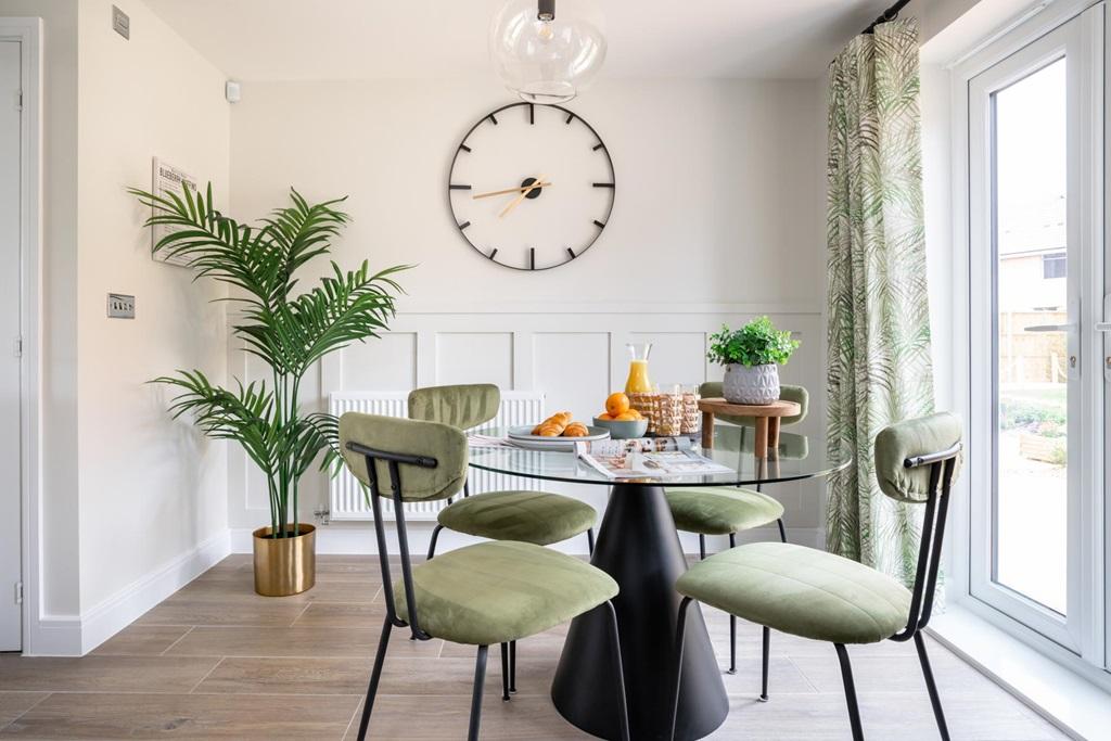 A dining area with views of the rear garden