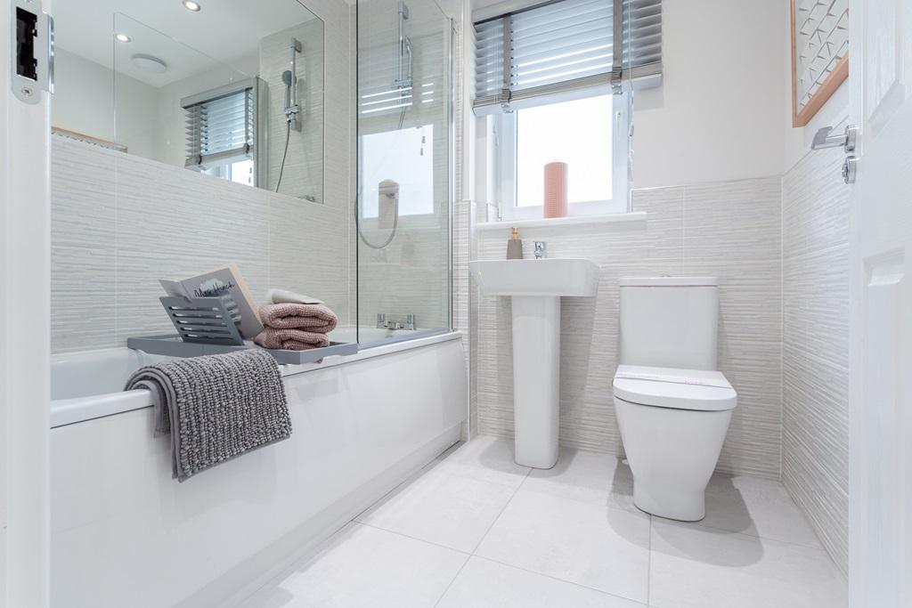 The main bathroom with shower over bath