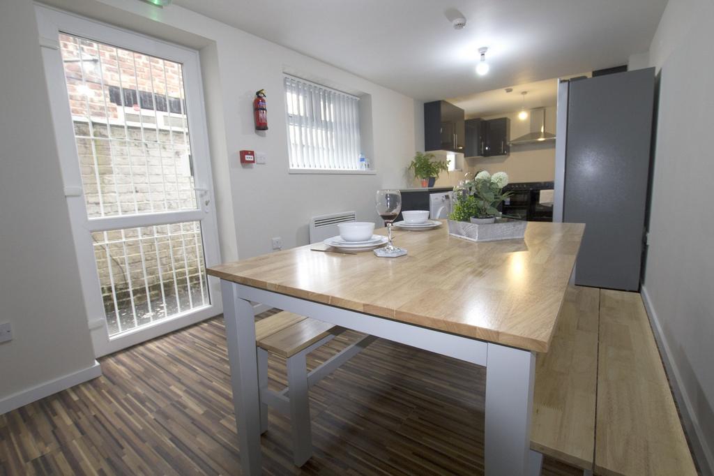 A bright and inviting kitchenette with a spacio...