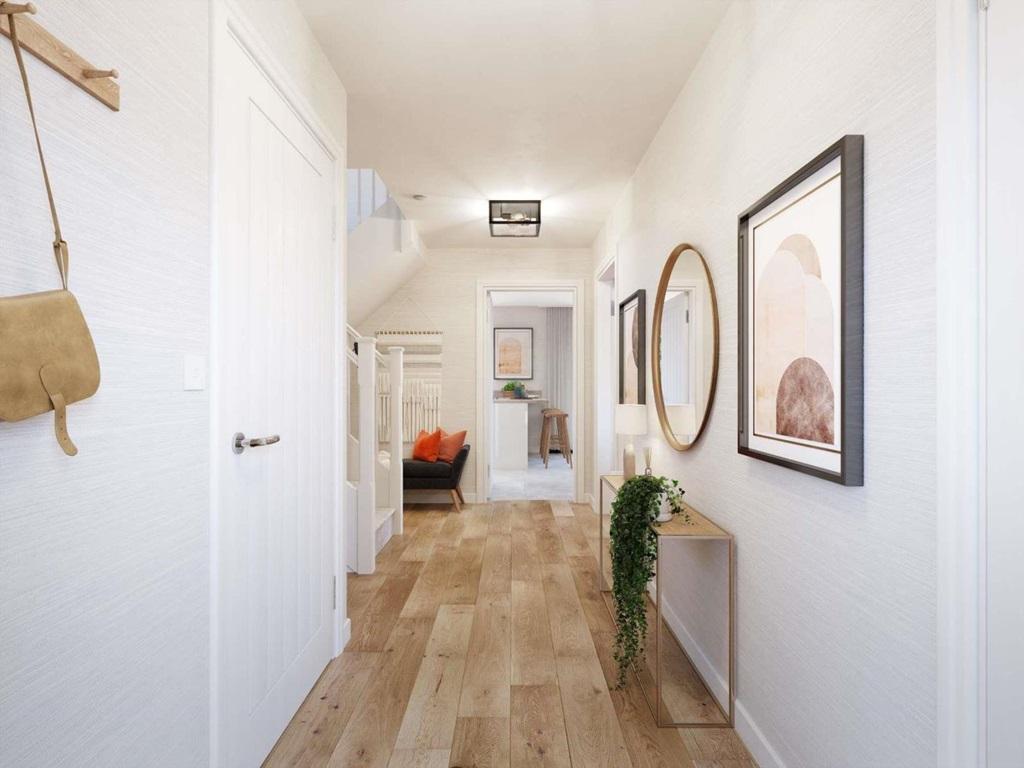 The central hallway allows for easy access to...