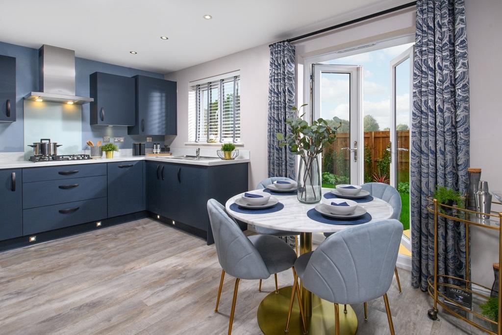 The stunning open plan kitchen looking through...