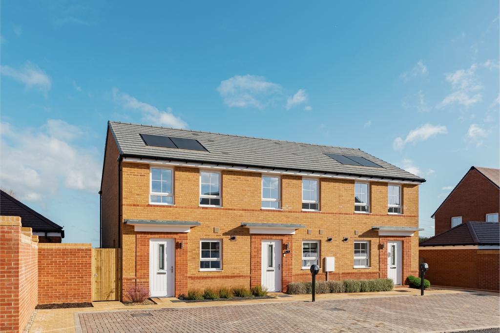 External shot of terraced denford at quarter...