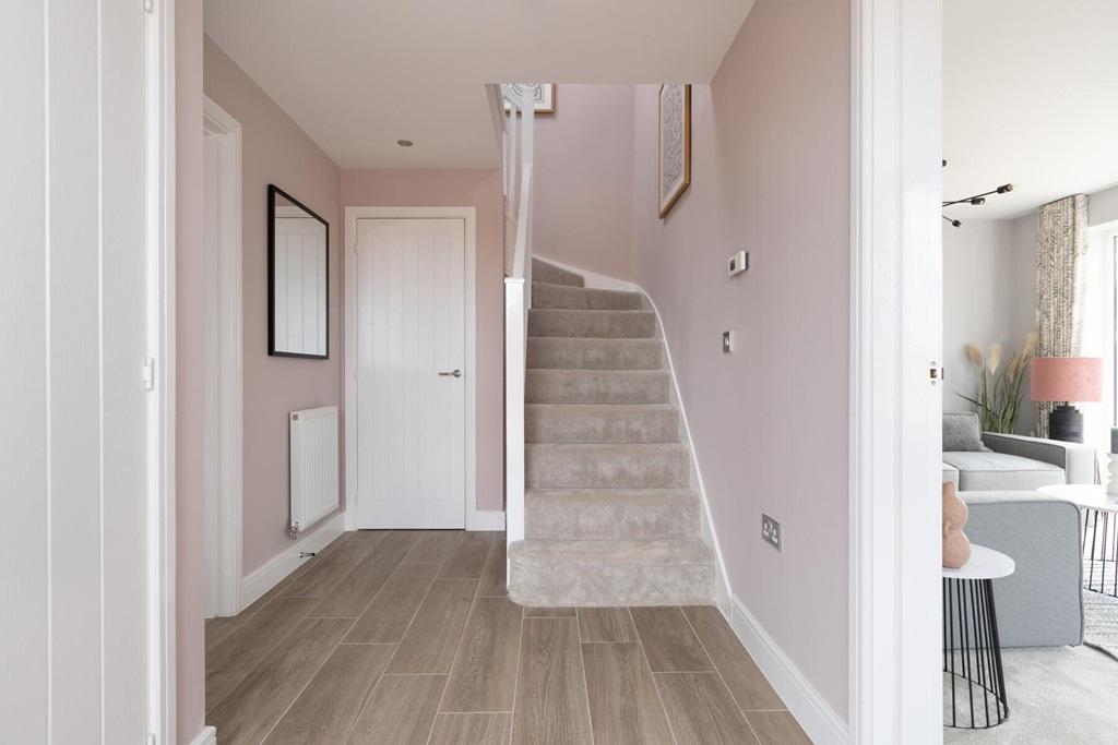 Spacious hall with handy under stairs storage